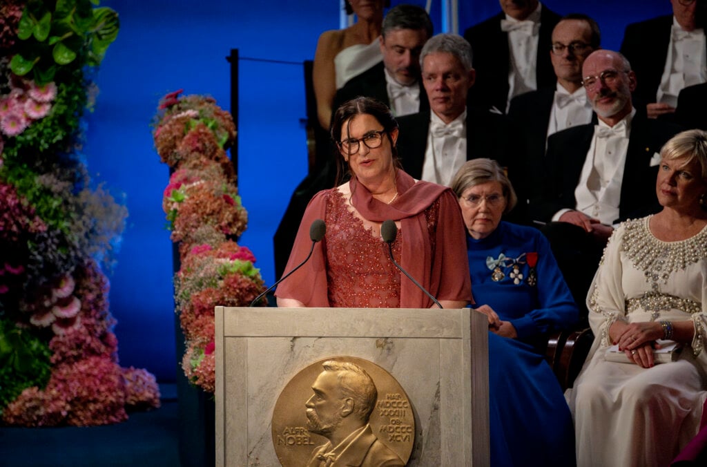 A woman in a lectern